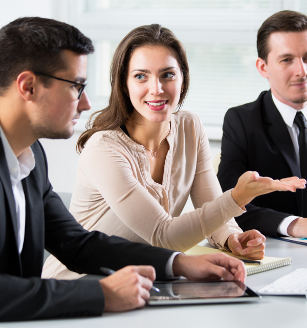 Image of business meeting with 3 people