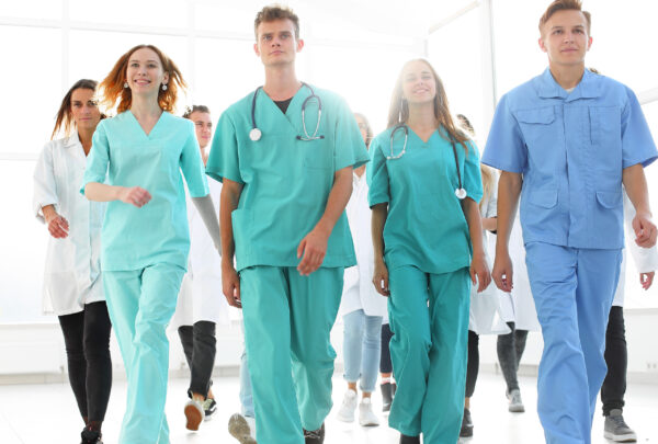 Group of student Doctors and Nurses walking
